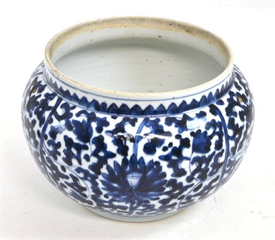 Lot 323 - A Chinese porcelain bowl painted on underglaze blue with scrolling lotus, 24cm wide