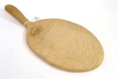 Lot 328 - A Robert ";Mouseman"; Thompson oak cheese board, with carved mouse on the board, 37cm