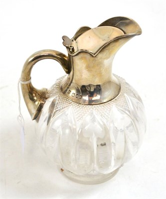 Lot 352 - Silver topped glass claret jug (a.f.)