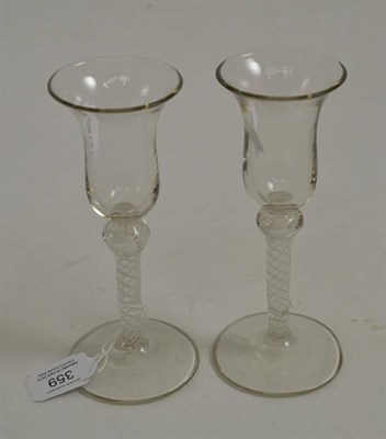 Lot 359 - Pair of 18th century ales with bell bowls and opaque stems