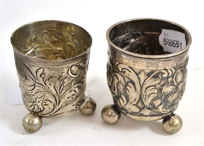 Lot 362 - A Danish white metal beaker, Copenhagen, circa 1831-40, with repousse foliate decoration, on...