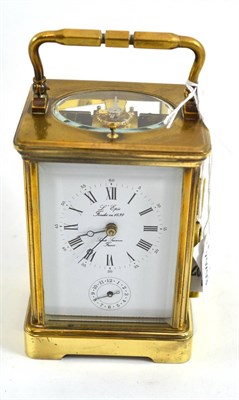 Lot 370 - A brass striking and repeating carriage clock with alarm, signed L'Epee, 20th century, carrying...