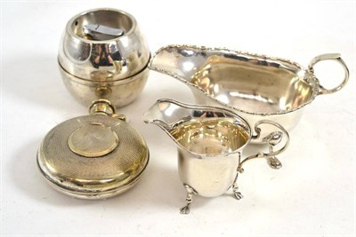 Lot 390 - Silver milk jug, small cream jug, round lighter and a hip flask (4)