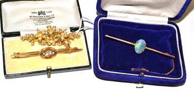 Lot 403 - Three brooches, including a seed pearl set spray brooch, an opal set bar brooch and an early...