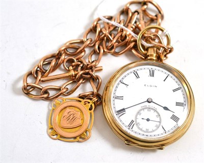 Lot 422 - A gold plated pocket watch signed Elgin, circa 1910, 50mm wide, and a watch chain, links...