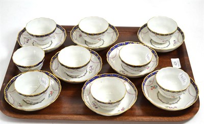 Lot 429 - A set of nine Derby porcelain tea bowls and eight saucers, circa 1780, painted with sprigs and husk