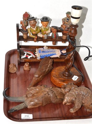 Lot 456 - A tray including oak barley twist table lamp, a linden wood carving of a fox, a carving of a...