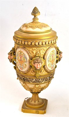 Lot 471 - A late 19th century Baroque style vase and cover, possibly Royal Worcester (chipped), 45cm high