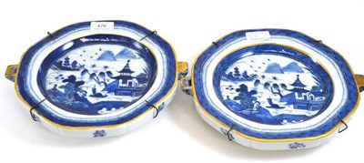 Lot 476 - A pair of Chinese hot water plates, 27cm diameter