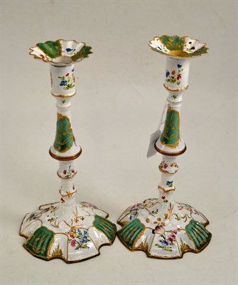 Lot 491 - Pair of enamel candlesticks (restored), height 28cm