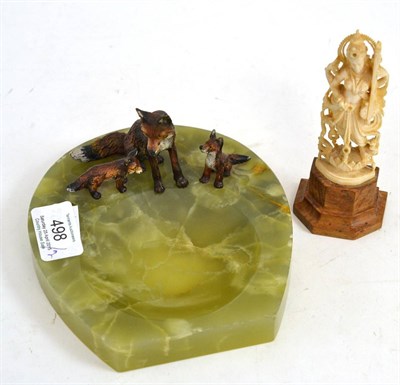 Lot 498 - An onyx ashtray, surmounted with a fox and two cubs, together with a late 19th century carved ivory