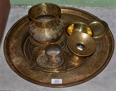 Lot 554 - Islamic brass charger, signed to verso and ten other pieces