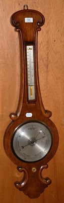 Lot 566 - A Victorian oak banjo barometer with silvered dial, height 94cm