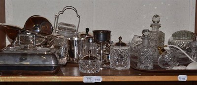 Lot 576 - Two shelves of mainly silver plate including serving dishes, entree dishes, galleried tray,...