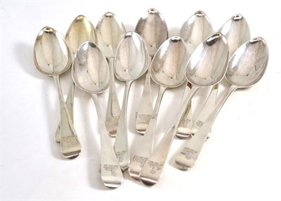 Lot 586 - A set of eleven George III provincial silver tablespoons, Robert Cattle & James Barber, York...