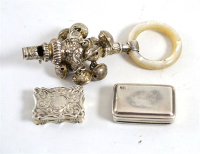 Lot 587 - A Victorian silver vinaigrette, Edward Smith, Birmingham 1843, another, and a child's silver rattle