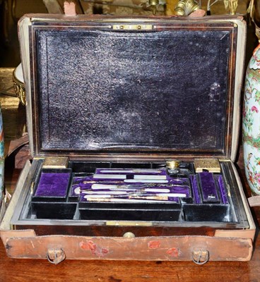 Lot 626 - A 19th century rosewood travel case with silver gilt fittings