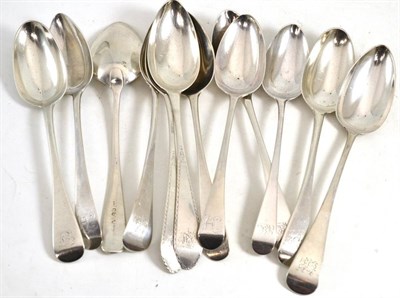 Lot 638 - Twelve assorted George III silver teaspoons, engraved with initials and some with bright cut...