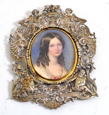 Lot 645 - English School (19th century), a miniature portrait of a young lady with ringletted hair and...