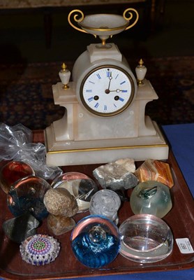 Lot 667 - An alabaster striking mantel clock and a quantity of paperweights, 3-inch enamel dial, twin...