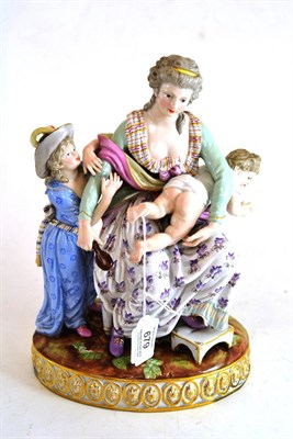 Lot 679 - A 19th century Meissen figure group modelled as a mother with children, 26cm high (restored)