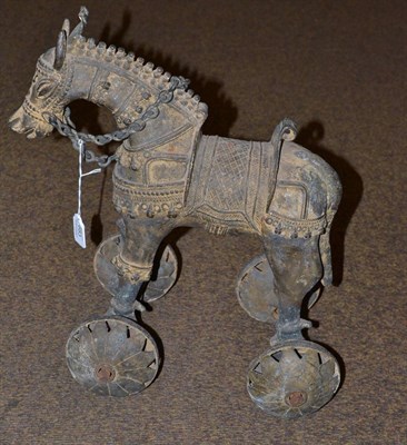 Lot 683 - An 18th century Kerala India bronze Temple Horse, dressed in ceremonial regalia and set on wheels