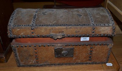 Lot 705 - A close nailed Pony skin covered dome top box and contents, 45cm wide