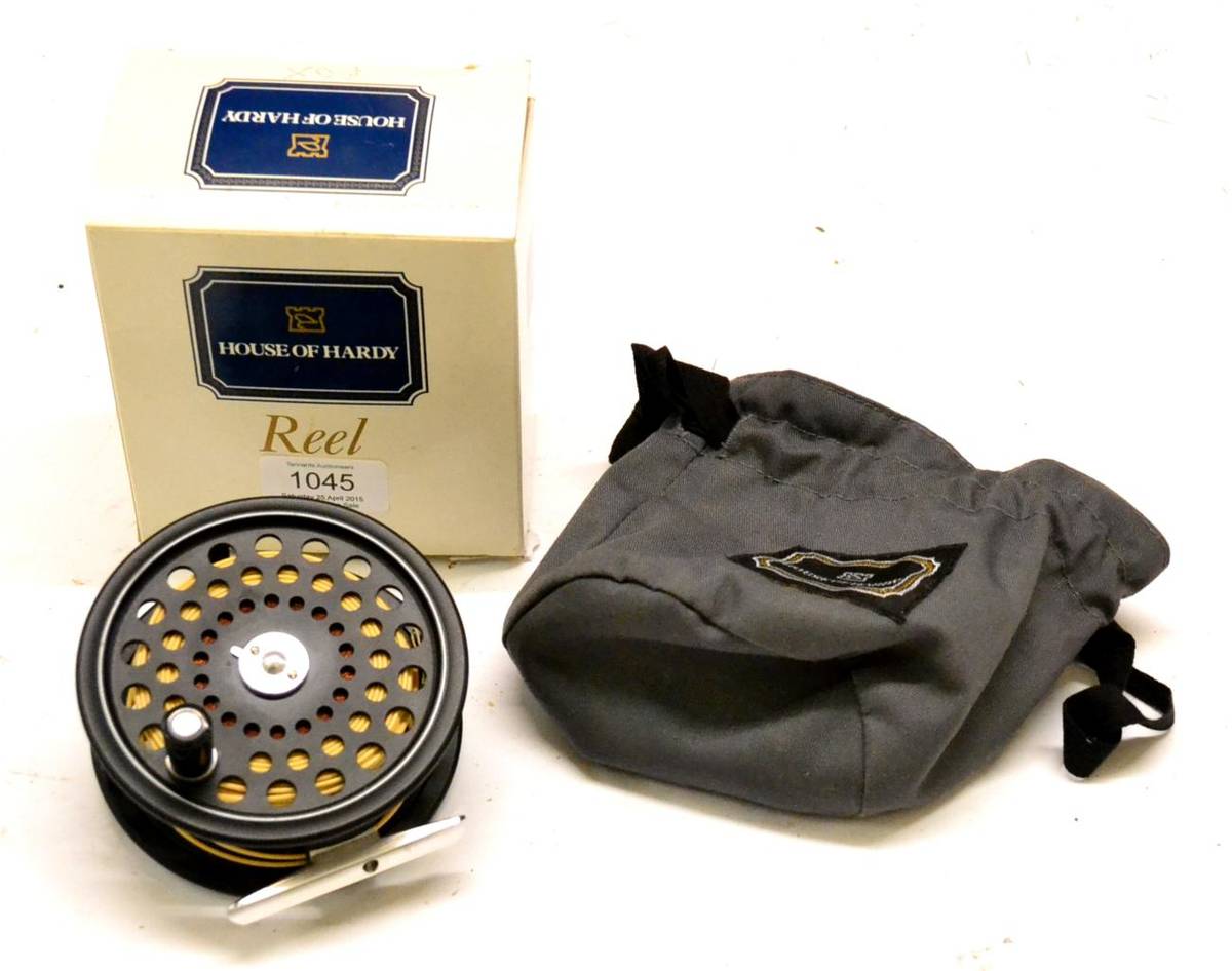 Lot 1043 - A Hardy 3inch Alloy 'The Sovereign No.7/8' Fly Reel, with golden finish, in a leather zip case,...