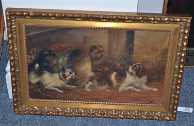 Lot 1193 - Frank Cassell (19th century), Terriers and a spaniel beside a barrel in a farmyard, signed, oil...