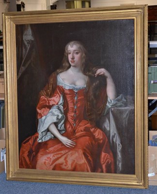 Lot 1208 - Follower of Sir Peter Lely (1618- 1680) A three quarter length portrait of a lady wearing a red...