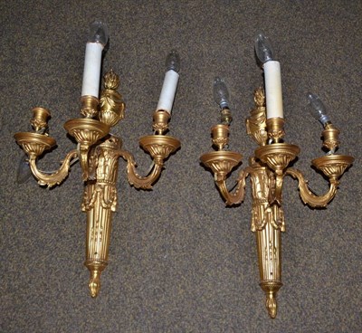 Lot 1314 - A pair of 20th century gilt metal wall mounted candelabra