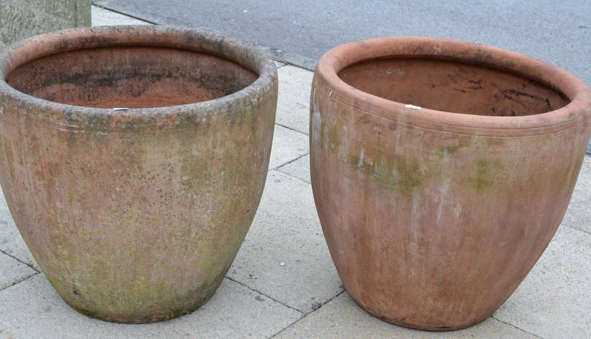 Lot 1331 - Two large terracotta planters, 60cm and 63cm diameter