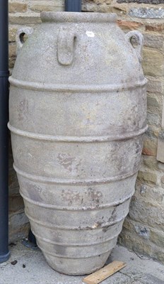 Lot 1343 - Large terracotta olive jar planter with ribbed body and four handles, 125cm high