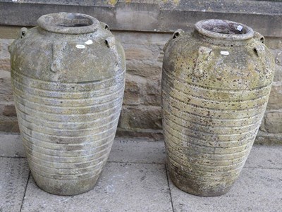 Lot 1344 - Pair of terracotta olive jar planters, 68cm high