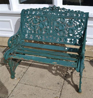 Lot 1361 - A Coalbrookdale style cast iron nasturtium bench, the rectangular back with mask cresting over cast