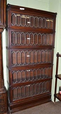 Lot 1386 - A Globe Wernicke five piece sectional bookcase with leaded glass doors