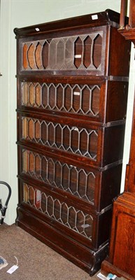 Lot 1392 - A Globe Wernicke five piece sectional bookcase with leaded glass doors