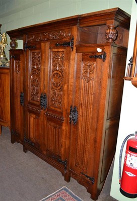 Lot 1395 - A 19th century French oak side cabinet