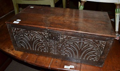 Lot 1406 - A 17th century oak bible box with carved panel to the front