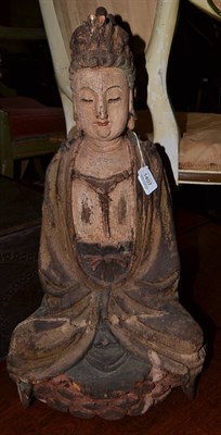 Lot 1407 - A 14th century style carved wooden figure of Bodhisattva seated on a stylised mountain, with...