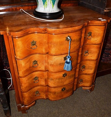 Lot 1433 - A walnut chest in the 17th century style fitted with four drawers