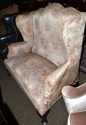 Lot 1451 - A 19th century wingback sofa on cabriole forelegs