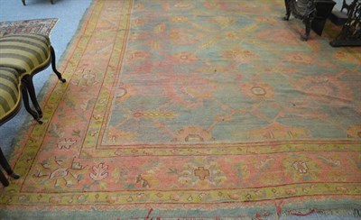 Lot 1467 - Ushak carpet, the aquamarine field with an allover lattice design of angular vines and large...