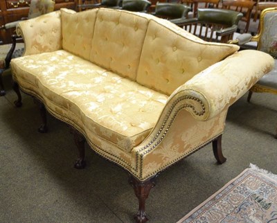 Lot 1472 - A 19th century Chippendale style sofa covered in yellow watered silk