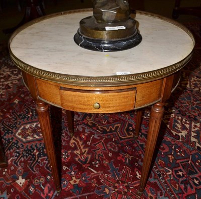 Lot 1489 - Late 19th century French marble topped circular table on fluted legs