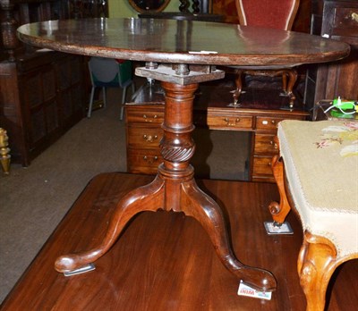 Lot 1492 - An 18th century mahogany flip top table