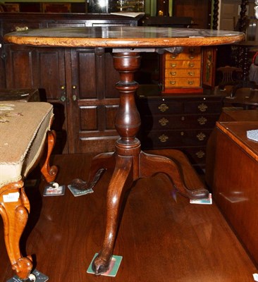 Lot 1494 - George II mahogany one-piece tripod table