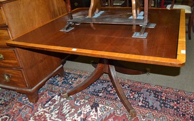 Lot 1497 - A mahogany satinwood banded and ebony strung breakfast table