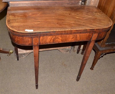 Lot 1512 - A Georgian mahogany games table