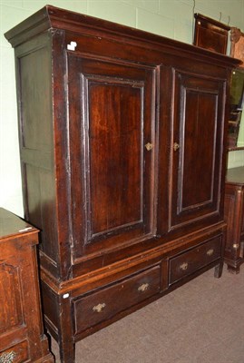 Lot 1528 - Georgian oak pegged tack cupboard